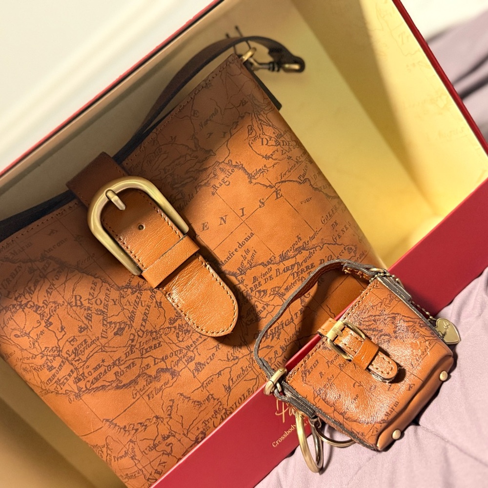 patricia nash crossbody with matching micro handbag hang off